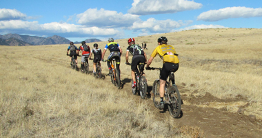 Biking group on Rim Rock Trail on North Table Mountain at Golden